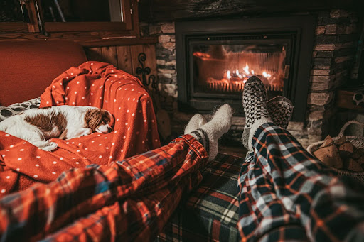 sitting at the fireplace