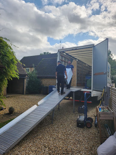 Unloading a washing machine from the lorry